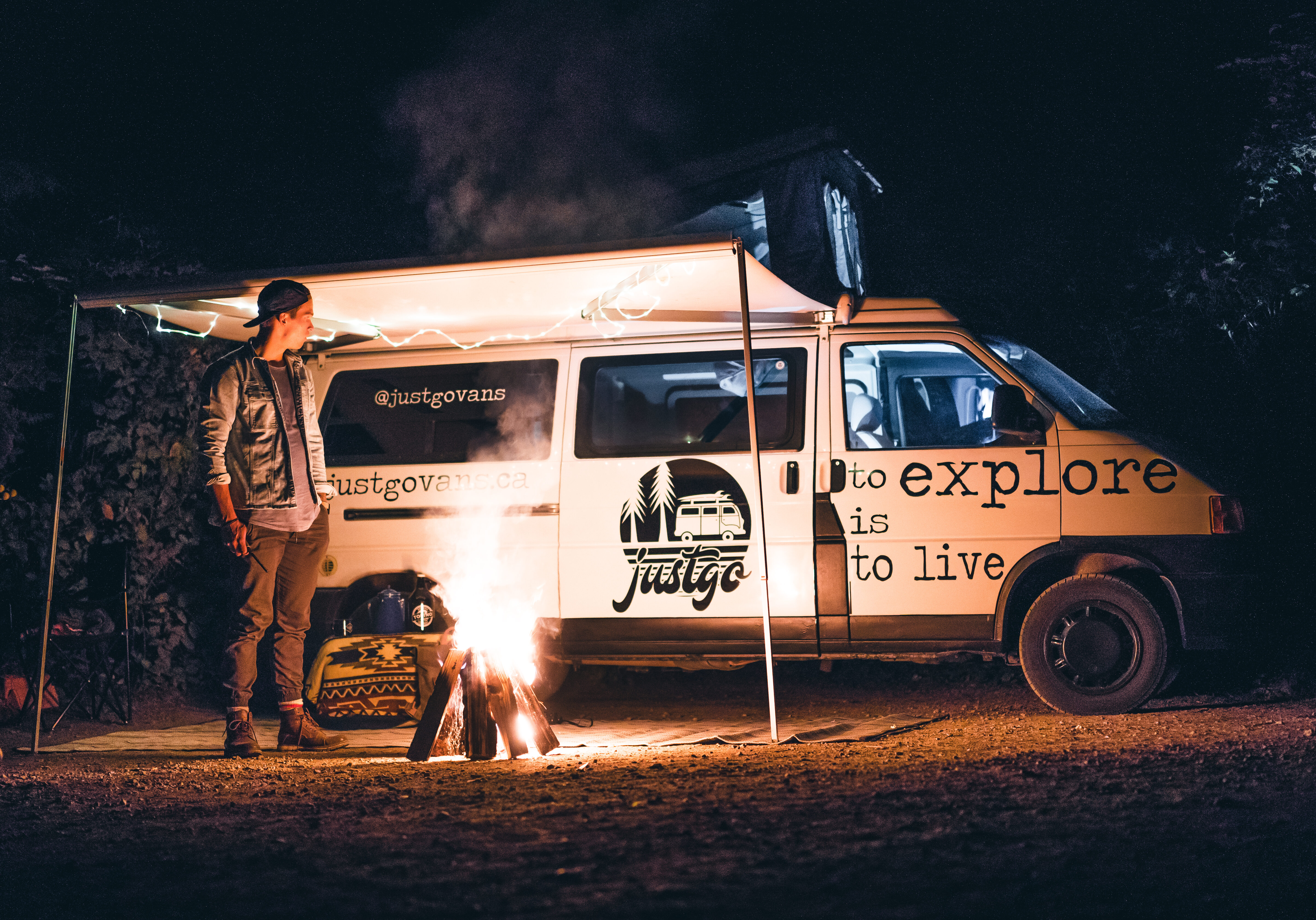campervan rental Nanaimo Vancouver Island campsite at night with campfire